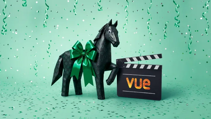 The wrapped black horse beside a Vue film clapperboard